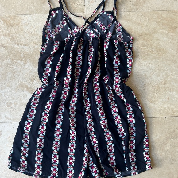 Black Striped Printed Romper with Crisscross Straps - Picture 4 of 5